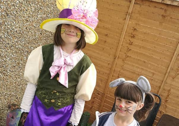 Abigail, left, with her five-year-old sister Eleni