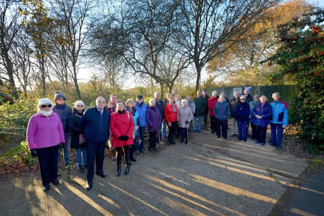 Residents of Spindlewood Drive, Little Common, last December. SUS-161129-151254001