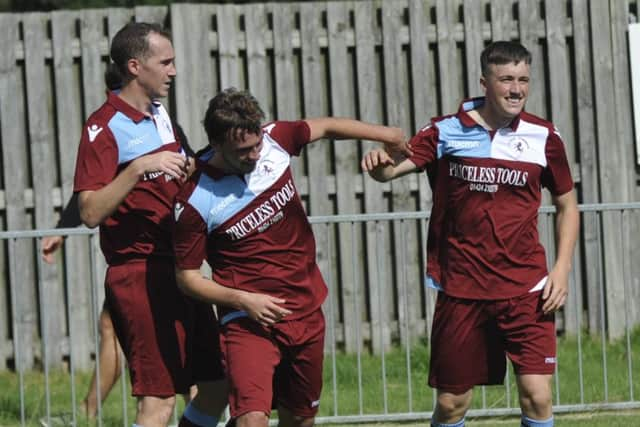 Common celebrate Harry Saville's terrific opening goal.