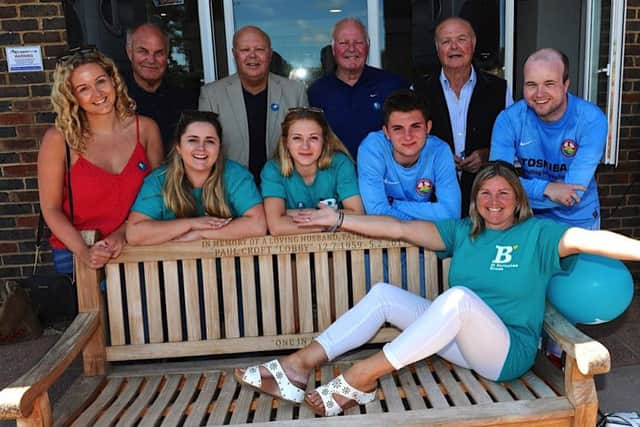 Millie with the memorial bench bought in Pauls honour. Picture: Stephen Goodger