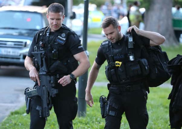 Armed police at the scene. Picture: Eddie Mitchell