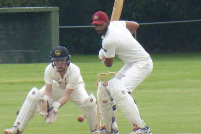 Sandun Dias shapes up to play an attacking shot.