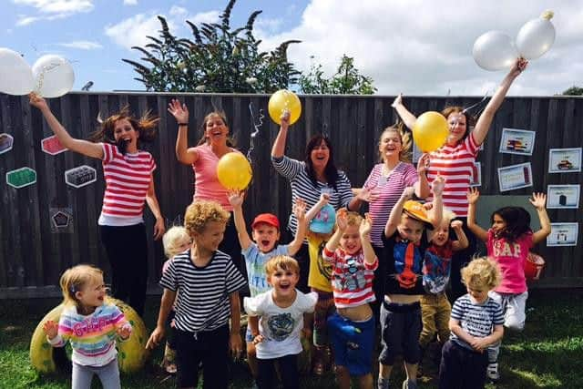 Children and staff from Hilltop Nursery