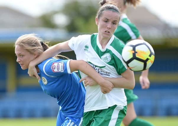 Lauren Cheshire tries to hold off her Basildon opponent