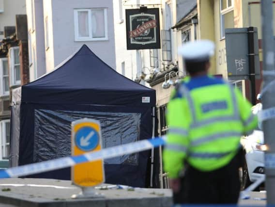 Police at the scene of the fatal incident (Photograph: Eddie Mitchell)