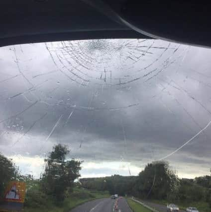 A broken windscreen on a Compass Travel school bus. Picture: Leah Keiley