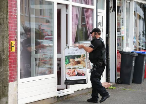 Police outside the wellbeing centre earlier today (September 19)