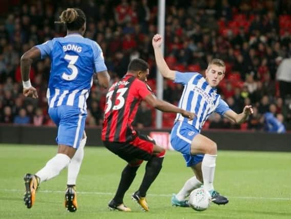 Uwe Hunemeier challenges Bournemouth winger Jordon Ibe. Picture by Angela Brinkhurst