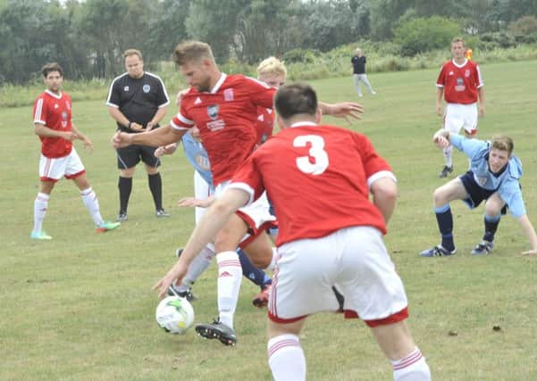 Rhys Whyborne on the ball for Bexhill Town in a Macron East Sussex Football League fixture against Crowhurst last season.