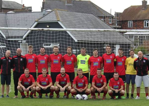 Rye Town Football Club in its new home kit sponsored by Rush, Witt & Wilson.