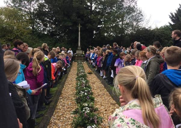 The 75th anniversary of Petworth Boys' School bombing at the graveside in Horsham Road cemetery