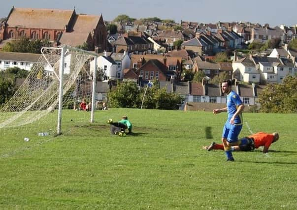 Richard 'Alfie' Weller scores one of his four goals for Rye Town against The JC Tackleway on Saturday.