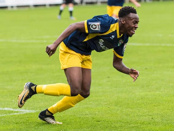 Kristian Campbell races off to celebrate his equaliser for the Rocks at Dartford / Picture by Tommy McMillan