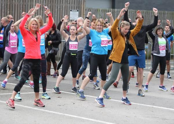 The warm-up at the Chichester Half Marathon / Picture by Derek Martin