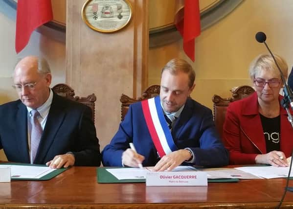 Bethune town hall where a celebratory charter was signed by The Mayor of Bethune Olivier Gacquerre, Deputy Director of culture for Bethune  Maryse  Bertoux and Ken Sharples (left)  Chairman of the Hastings Association of Twin Towns