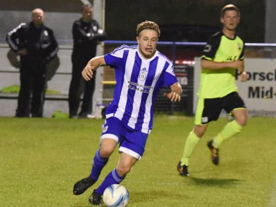 Max Miller celebrates his goal. Picture by Grahame Lehkyj. George Hayward on the ball.