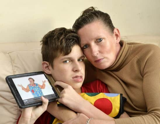 Disappointed: Vinny Holman and his mother Catherine. Photograph by Jon Rigby