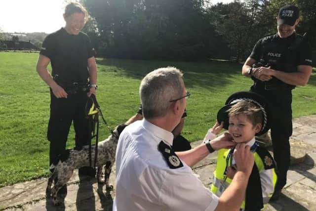 Swapping ties with DCC OReilly. Sussex Police pictures