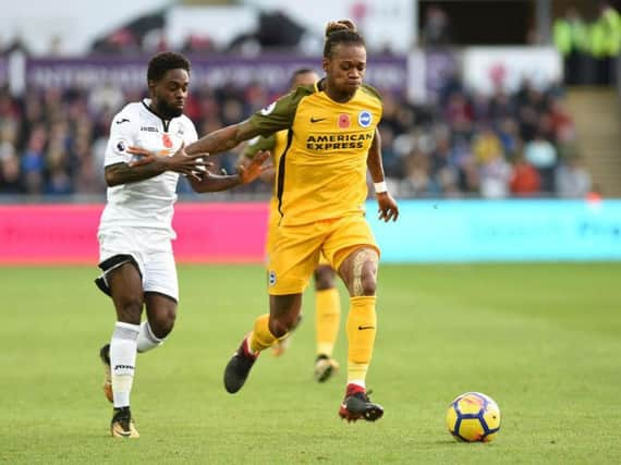 Gaetan Bong and Nathan Dyer battle for the ball. Picture by Phil Westlake (PW Sporting Photography)