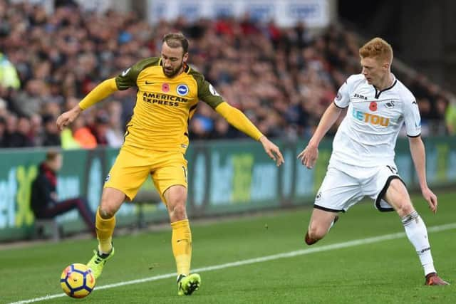 Glenn Murray holds the ball up. Picture by Phil Westlake (PW Sporting Photography)