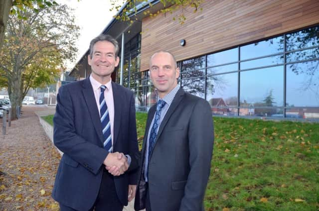 Left Seaford headmaster John Green with Amiri Construction director Martin Tidby