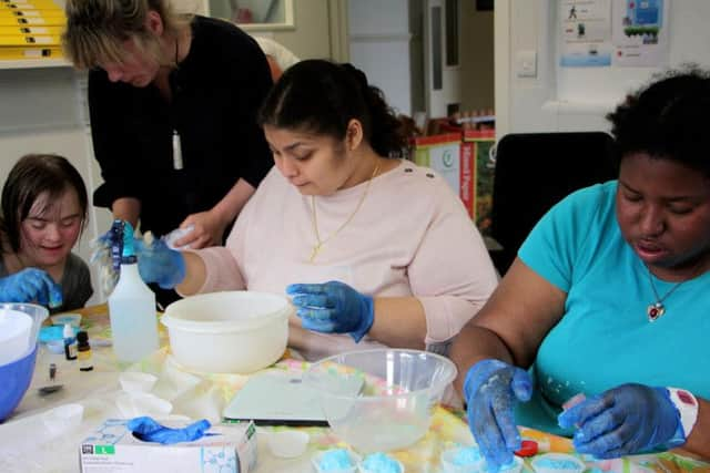 Team Domenica candidates developing new skills in their training centre (Photograph: Sally Durrant/sallydurrant.com)