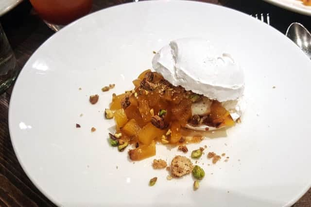 The 'delicious and light' dessert of peach pavlova with rum, yoghurt, pistachio and amaretti