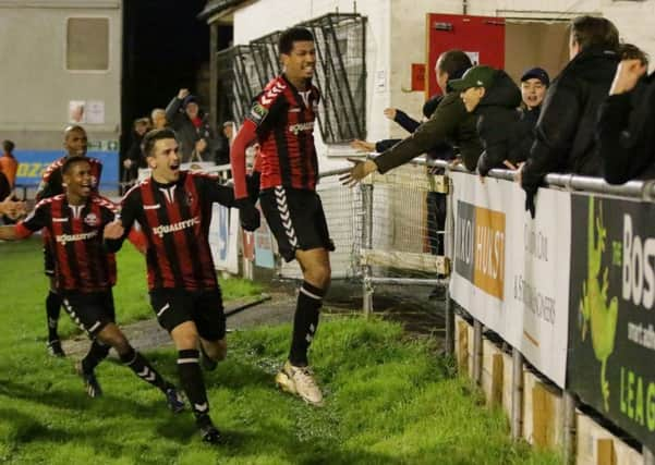 Jonte Smith celebrates at the Dripping Pan