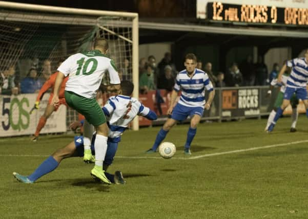 Ollie Pearce fires across goal against Oxford City / Picture by Tommy McMillan